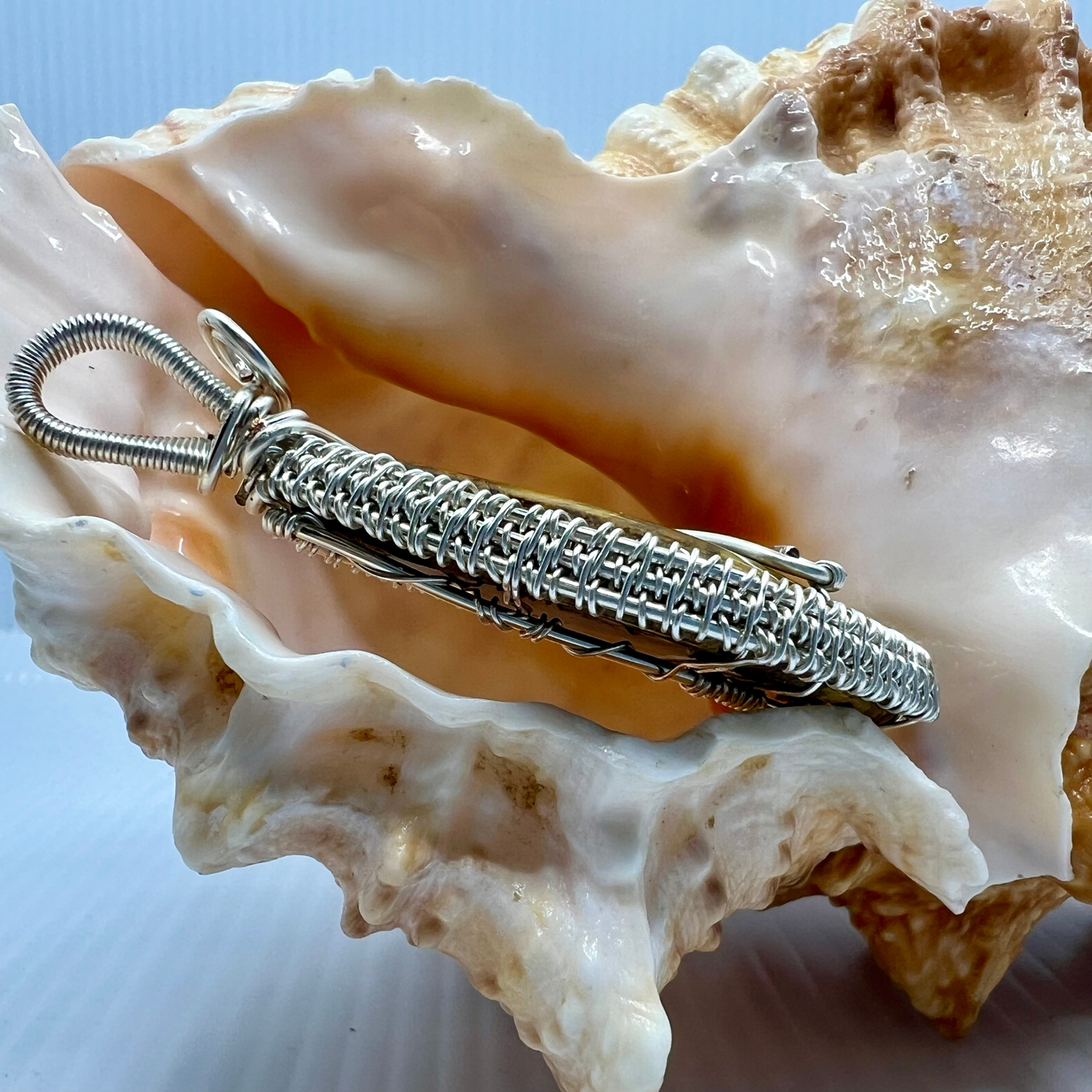 Thariel — Guardian of Resolve  Handmade Reiki-Infused Nellite Pendant