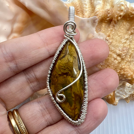 Thariel — Guardian of Resolve  Handmade Reiki-Infused Nellite Pendant